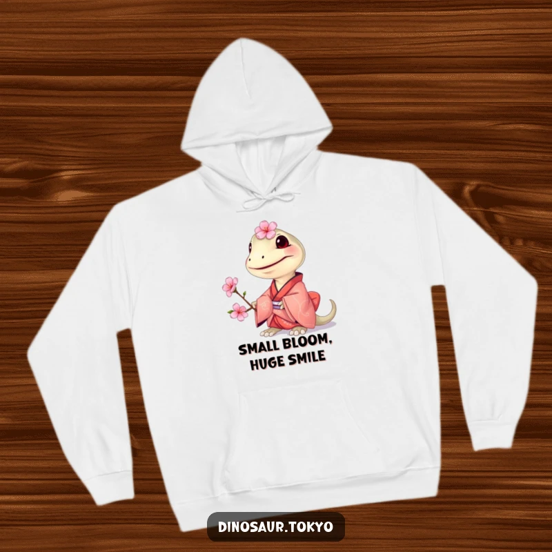 Funny Compsognathus Kimono Hoodie featuring a grinning tiny dinosaur in a small kimono, offering a cherry blossom for cozy, humorous style.