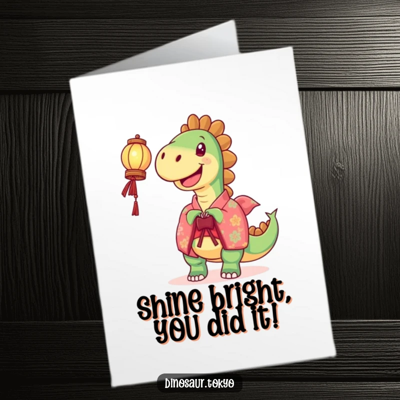 Funny free printable congratulations card showing a joyful dinosaur in a kimono holding a lit lantern.